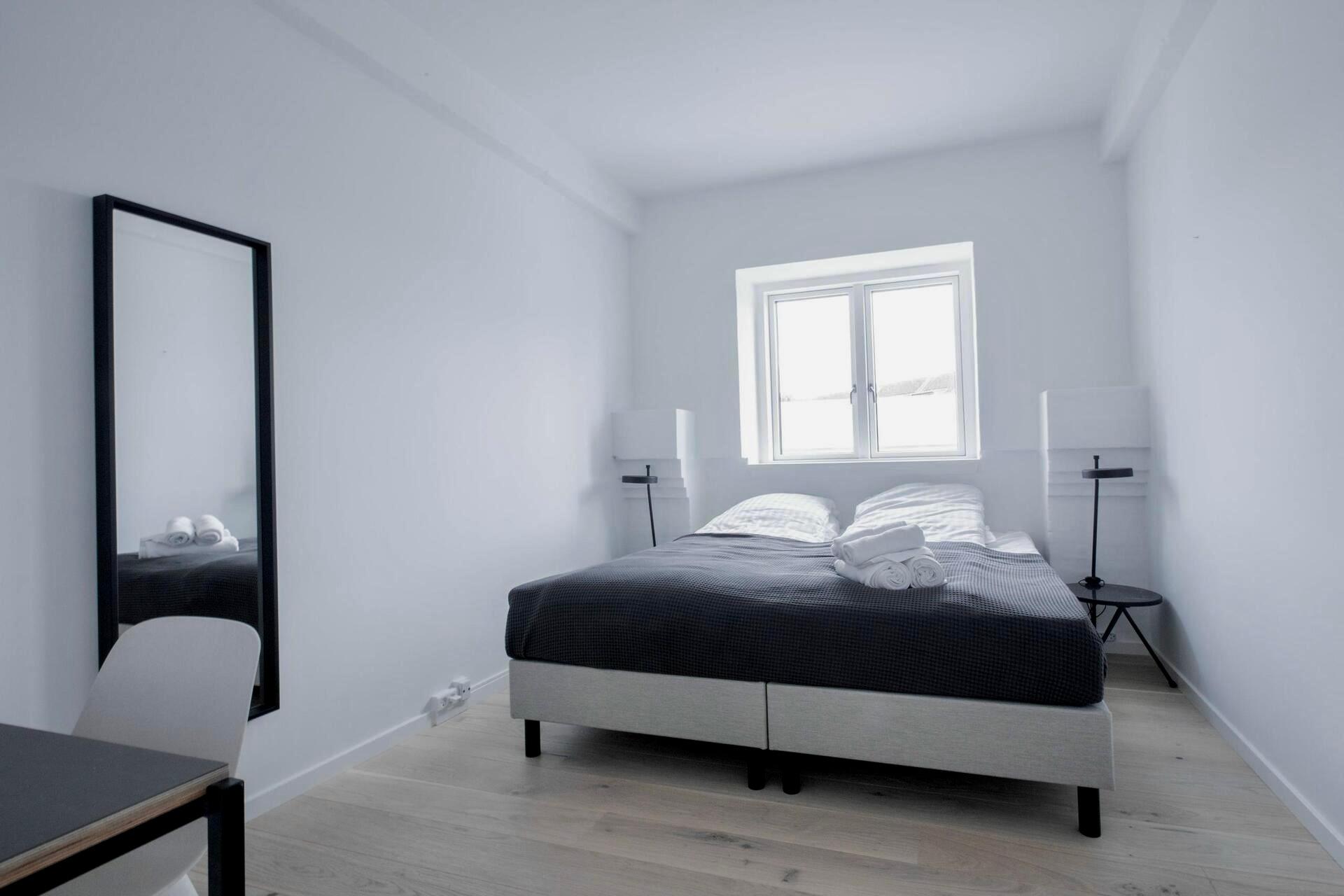 A bedroom of a Copenhagen Coliving apartment